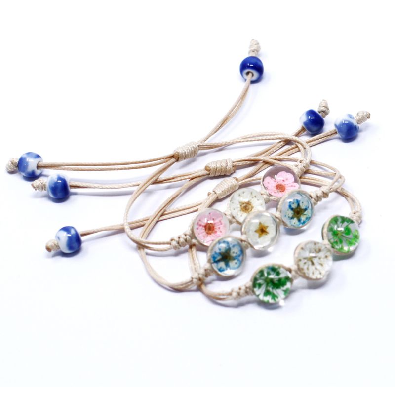 Lot de 4 Bracelets 3 Fleurs Pressées