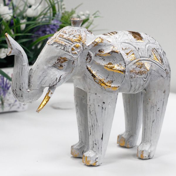 Éléphant en bois sculpté - Or blanc