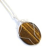 Collier de pierres précieuses enveloppées de tourbillons - Oeil de Tigre