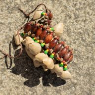 Shaker de cheville en coquillages Kenari - Bracelet à cliquetis (20 coquillages)