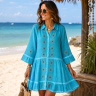 (M-L) Nomad Sari dans la collection On the Med - Robe tunique - Turquoise avec imprimé bloc œil protecteur