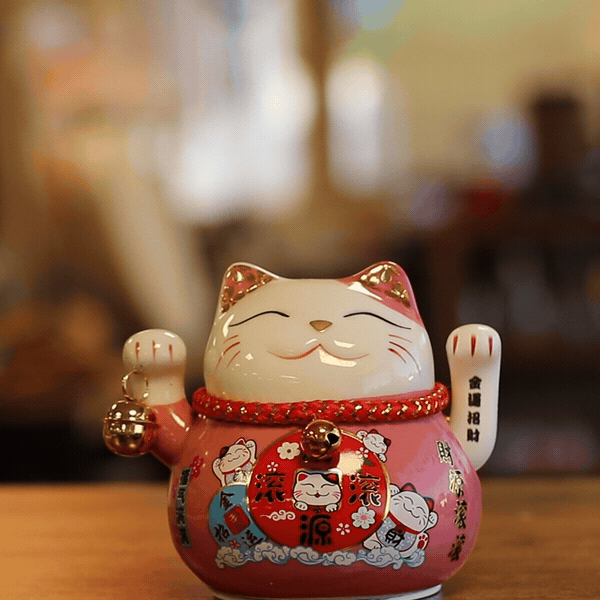 Chat Porte-Bonheur en Céramique à Patte Mobile – Rose sur Coussin (piles non incluses)